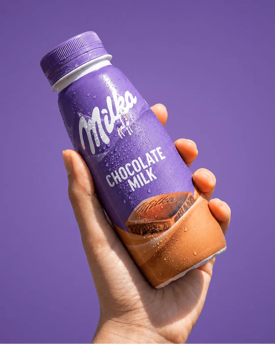 Milka tejital bevezető kampány termékképpel lila háttéren